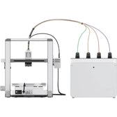 Creality SPARKX i7 3D printer front view beside the CFS Lite box with four filament tubes running to the toolhead