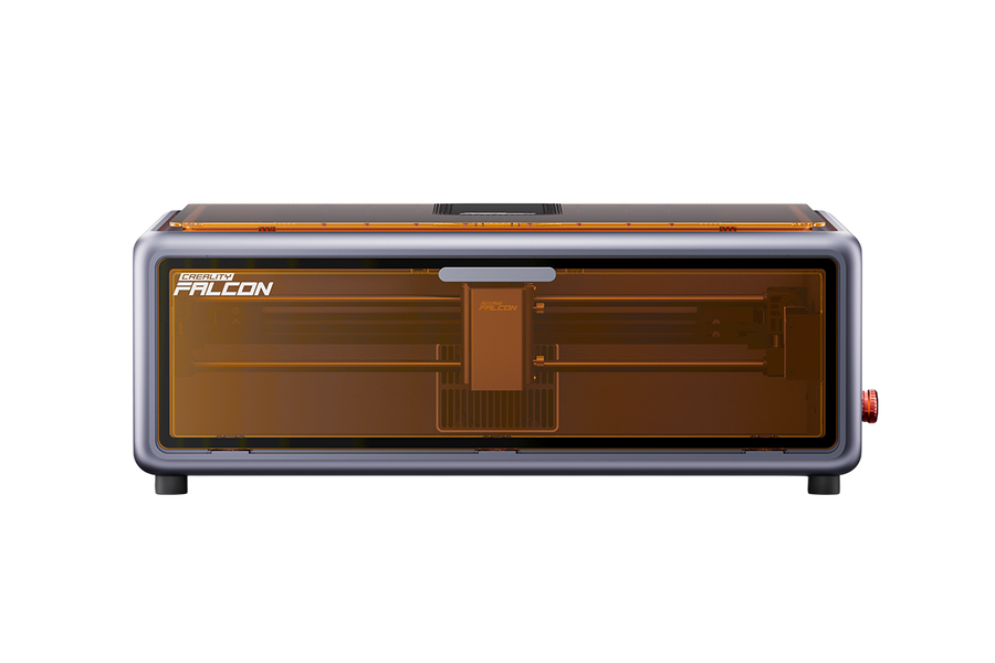 Creality Falcon A1 enclosed laser engraver, front view with orange tinted window and red emergency stop button